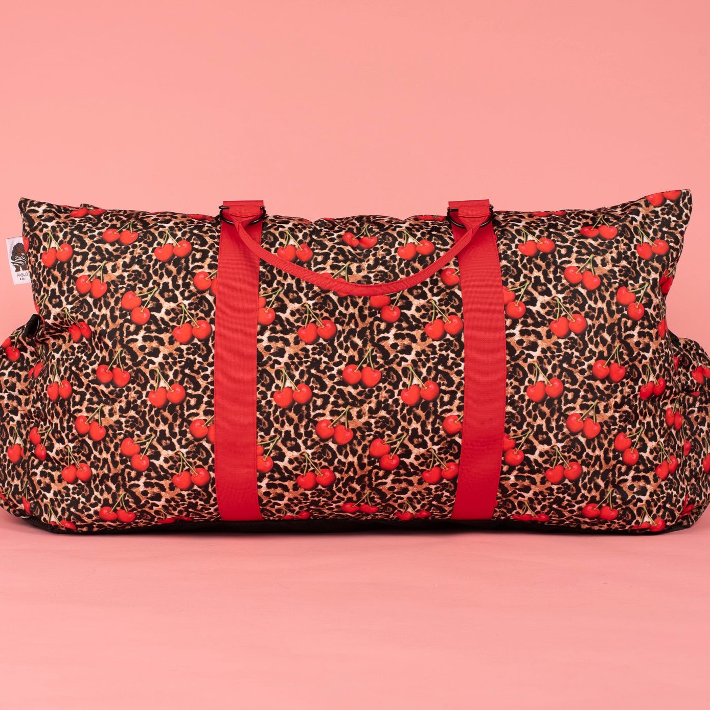 Deluxe Travel Car Bed: Leopard Cherries (restocking November)